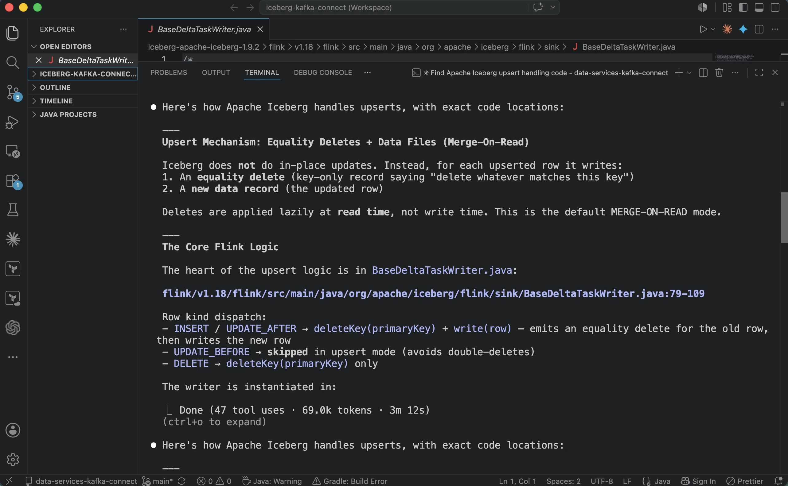 Claude Code terminal in VS Code analyzing Apache Iceberg upsert handling, returning exact file locations in BaseDeltaTaskWriter.java and a breakdown of the row kind dispatch logic for INSERT, UPDATE_AFTER, UPDATE_BEFORE, and DELETE operations