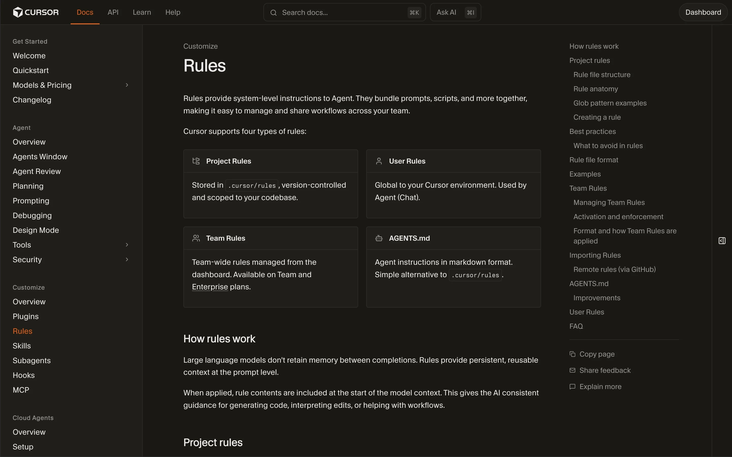 Cursor documentation Rules page showing four rule types: Project Rules stored in .cursor/rules and version-controlled, User Rules global to your Cursor environment, Team Rules managed from the dashboard for team and enterprise plans, and AGENTS.md as a markdown alternative to .cursor/rules